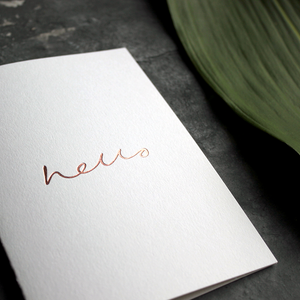 an all round card to send for any occasion that has hello hand written and foil stamped in rose gold